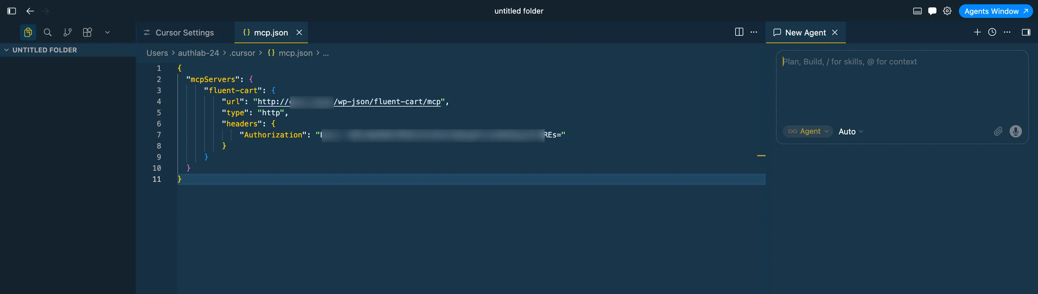 Screenshot of an mcp.json file in Cursor containing the fluent-cart MCP server block with the URL and Authorization header
